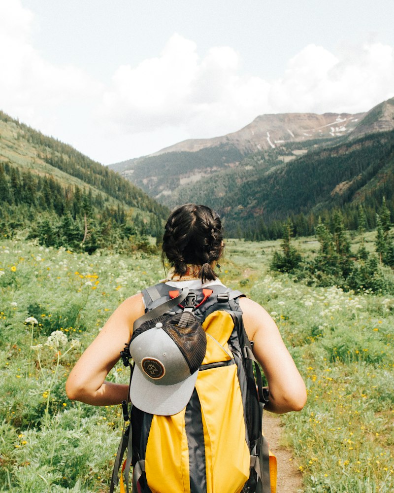 Woman traveling with a backpack outdoors